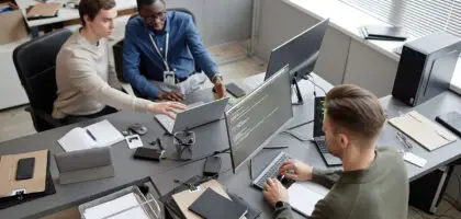 Corporate business owners collaborating with a digital marketing agency team in India to scale online presence and revenue growth