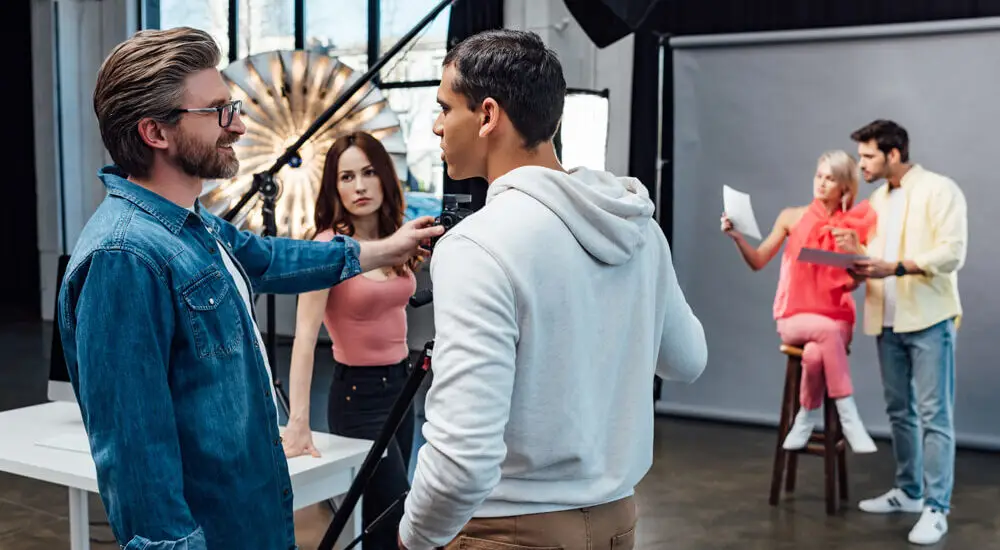 Behind the screen video production crew filming a cinematic brand commercial and promotional marketing content for Link Launch Studio